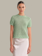 Model wearing a Silt Green Faye Rolled Edge Sweater Tee by 525 america with short sleeves and a relaxed fit