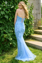 Faviana Prom Dress Style 11472 featuring a strapless lace-up back and delicate floral embroidery in light blue fabric outdoors