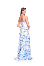 Woman wearing a blue and white floral tiered gown with lace-up back, Dave & Johnny Prom Dress Style 12939W