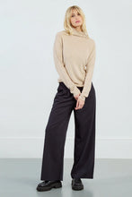 Molly Bracken Crystal Beige Top with rhinestone sleeve accents and high turtleneck.
