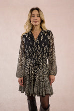 Molly Bracken Estelle Dress in printed black voile with tie waist, ruffled hem, and long sheer sleeves.