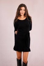 Molly Bracken Allure Sweater Dress with round neckline, tie waist belt, and ruffled hem in black