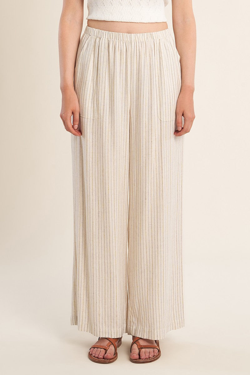 Front view of Light Beige Luxe Pants by Molly Bracken with vertical stripes and wide-leg fit on a model