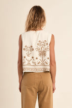 Back view of White Sands Vest by Molly Bracken with intricate brown floral embroidery on cream fabric