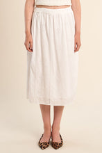 OffWhite Stella Skirt by Molly Bracken, mid-length with delicate eyelet floral patterns and elastic waistband.