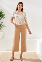 Woman wearing Tribal Comfort Stretch High Rise Palazzo Pants in tan styled with floral print top and sandals