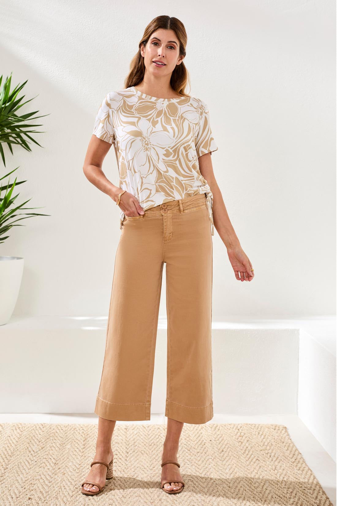 Woman wearing Tribal Comfort Stretch High Rise Palazzo Pants in tan styled with floral print top and sandals
