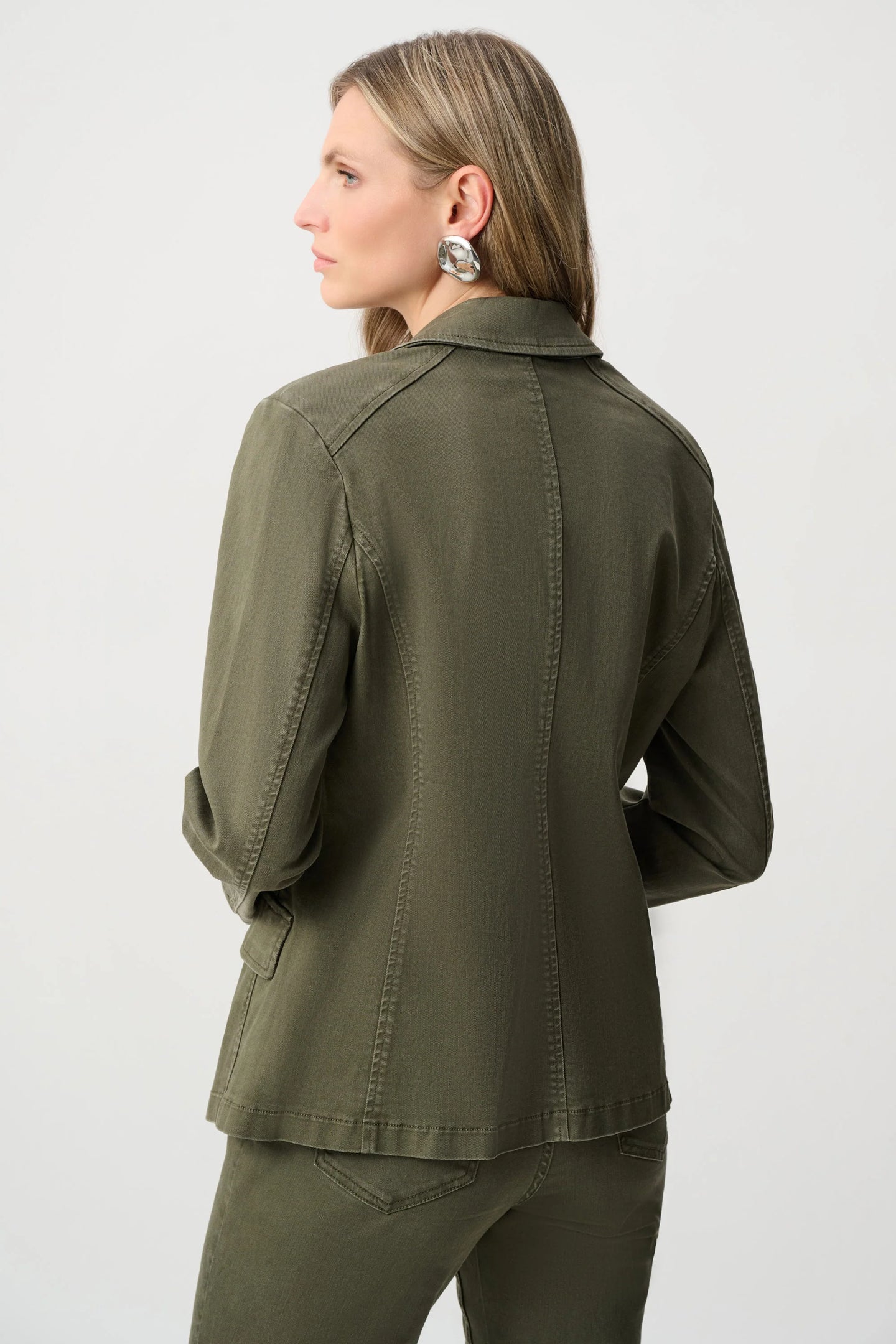 Avocado Blazer by JOSEPH Ribkoff in olive green, shown from the back on a model