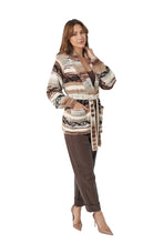 Love Token Atsa earth-tone patterned cardigan, styled with brown pants
