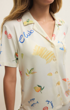 Close-up of a lightweight Vanilla Ice Beach Days PJ Top by z supply featuring coastal-inspired prints and a relaxed fit
