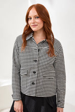 Woman wearing Tribal Gingham Button Front Collared Jacket With Pockets in black and white gingham with long sleeves
