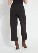 Lysse Denim black pants shown from the back with rolled cuffs and brown heeled boots by Lysse