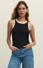 Woman wearing Black Clarke Rib Tank by z supply with contrasting trim and ribbed texture paired with blue jeans