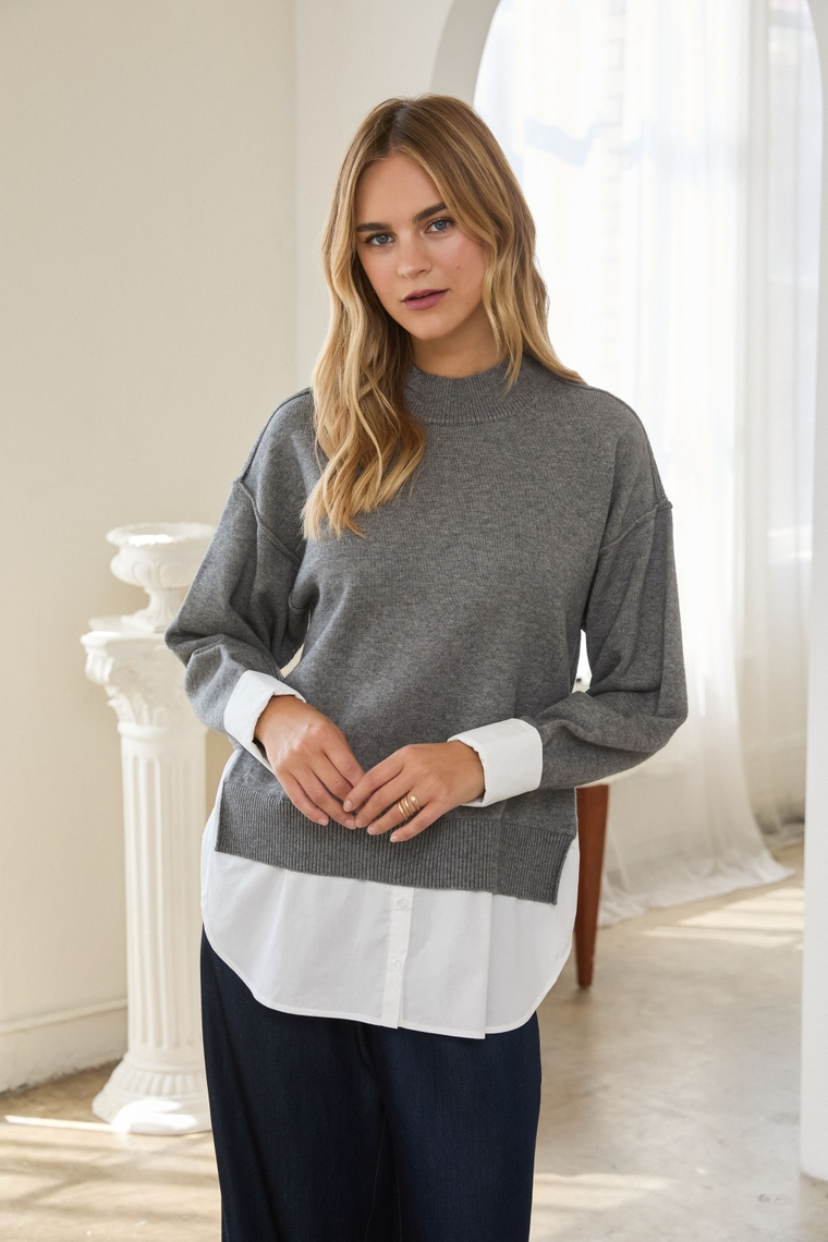 Twofer Layered Knit Top by skies are blue, gray knit top layered over a white shirt hem and cuffs on a model