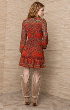 Orange Winifred Dress by hale bob with long sleeves paisley print and flared skirt shown from the back