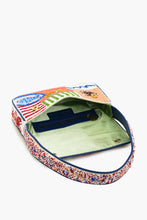 Sun & Sea Beaded Shoulder Bag by America & Beyond with colorful beaded pattern and green fabric interior pocket lining.