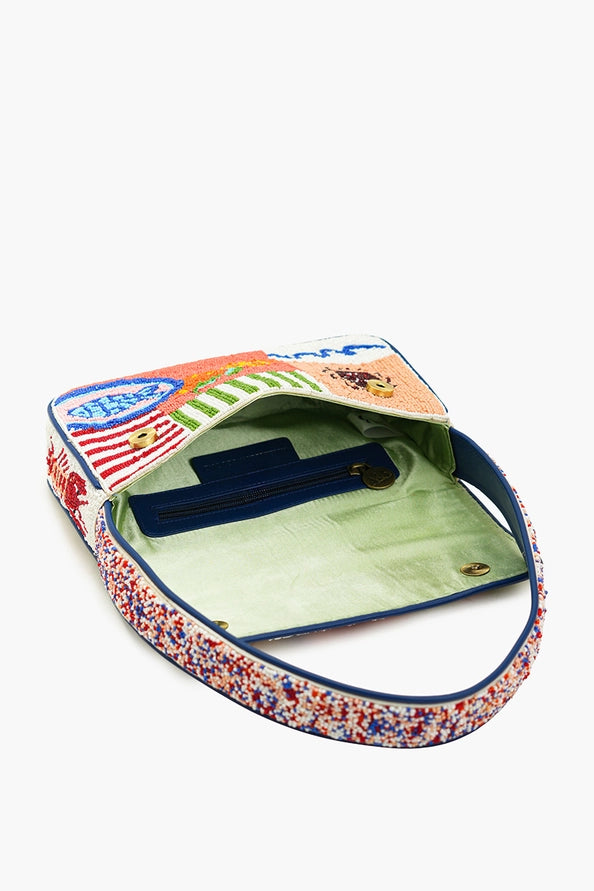 Sun & Sea Beaded Shoulder Bag by America & Beyond with colorful beaded pattern and green fabric interior pocket lining.