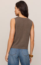 Woman wearing a brown Pebble Coast Syd Sweater Vest by z supply paired with blue jeans, shown from the back.