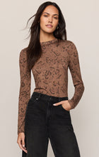 Cocoa Bean Onyx Snake Top by z supply worn as a long sleeve snake print top with black jeans