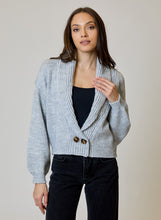 Airstream Shawl Collar Cardigan by design history in light gray knit with button front worn by a model