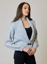 Airstream Shawl Collar Cardigan by design history in light blue, modeled with a black top