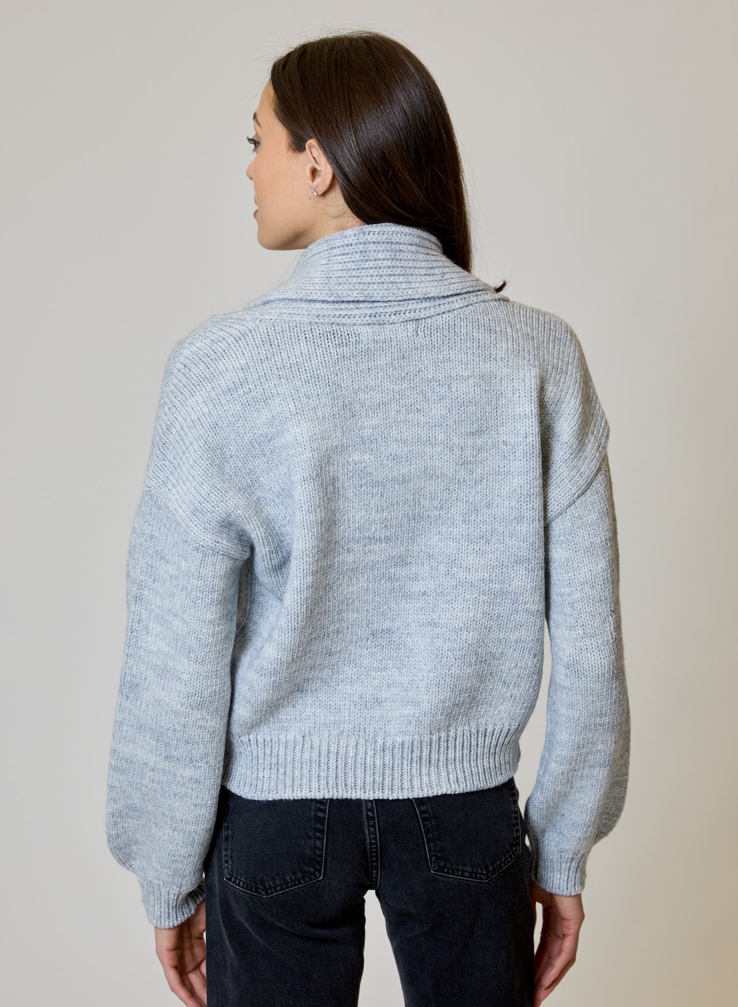 Airstream Shawl Collar Cardigan by design history shown from the back in light blue knit