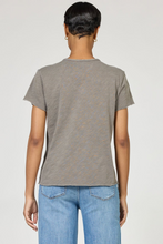 Back view of a model wearing a gray Vanya V Neck Tee by dear john with a relaxed fit and short sleeves