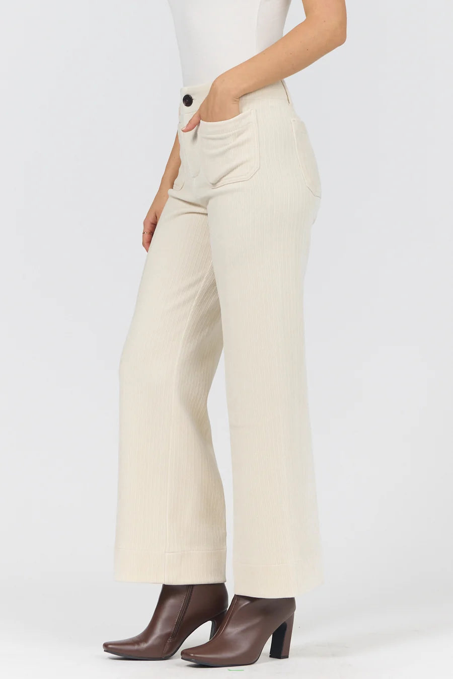 Dear John Pant by Dear John in ivory wide leg ribbed fabric with front pockets and brown heeled boots