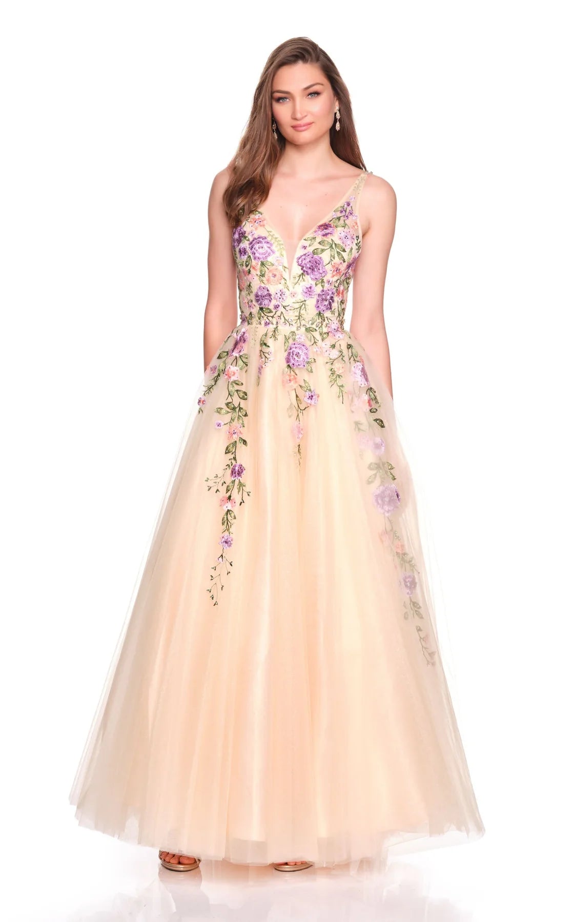 Dave & Johnny Prom Dress Style 12479 features a nude tulle gown with floral embroidery and a deep neckline.