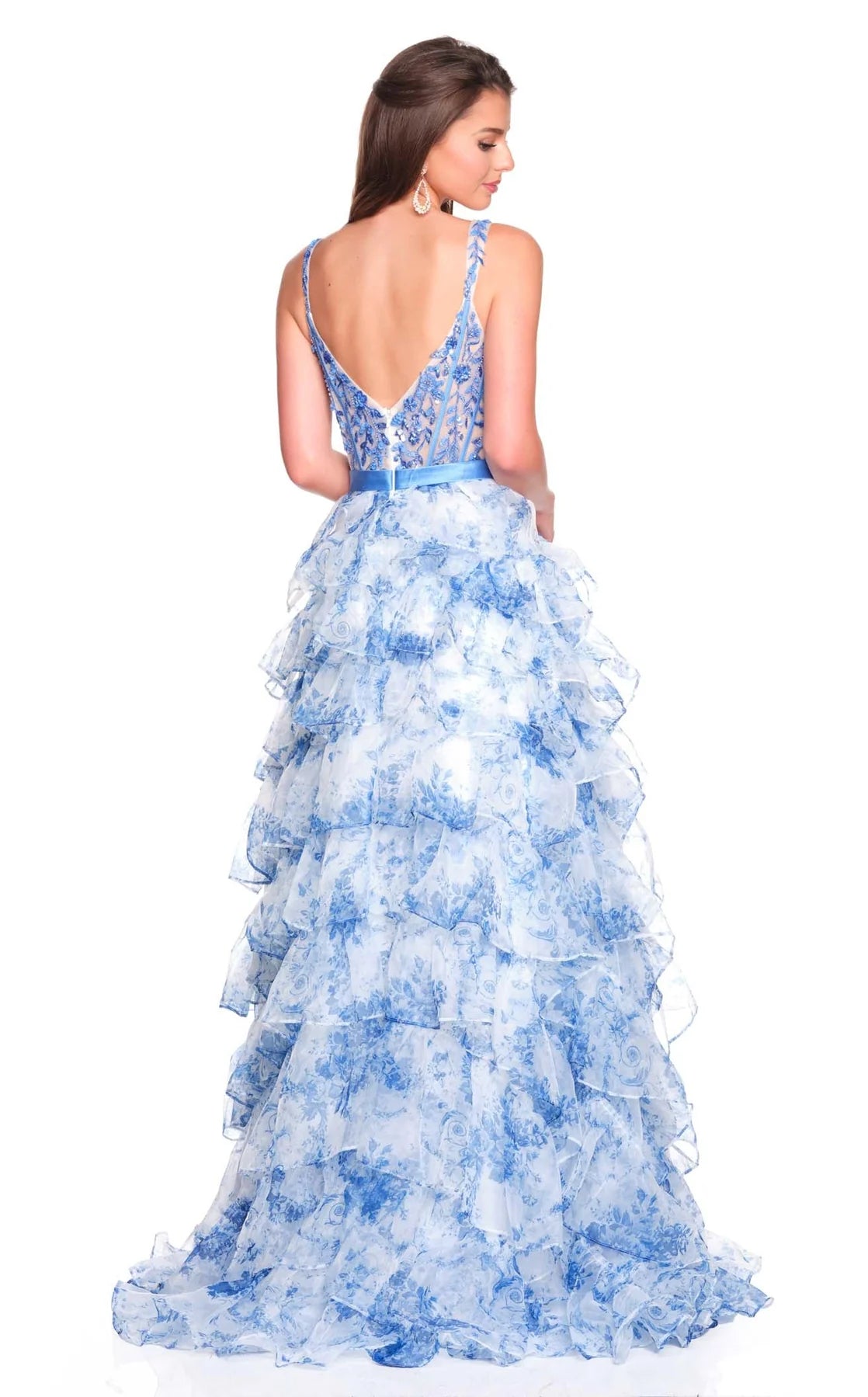 Back view of Dave & Johnny Prom Dress Style 12765W featuring tiered blue floral ruffled skirt and low V back design