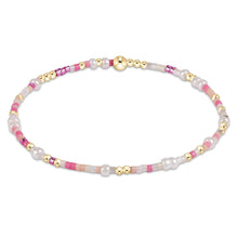 Delicate beaded Hope Unwritten Bracelet - Kiss And Tell with pink, white, and gold accents by Enewton boutique jewelry