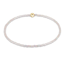 Delicate beaded jewelry featuring small silky white beads and a gold clasp, Hope Classic Bracelet - Silky White by Enewton