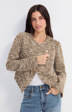 Woman wearing textured Gold Rush Moto Jacket by liverpool with gold buttons and casual blue jeans