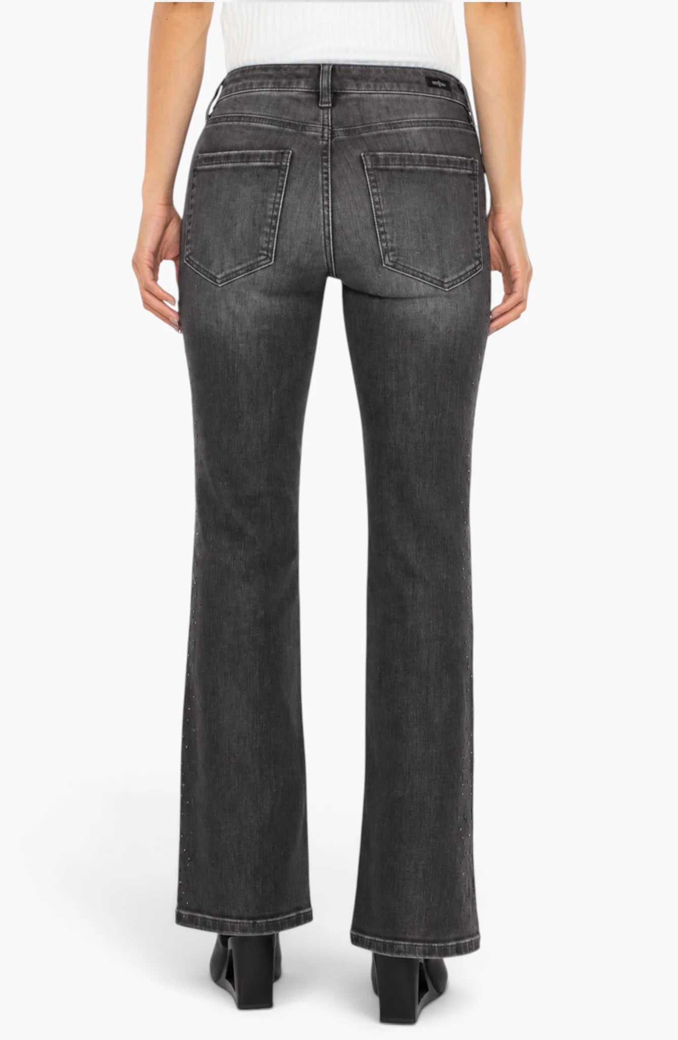 Liverpool Bootcut Jeans by Liverpool in dark gray shown from the rear with bootcut legs