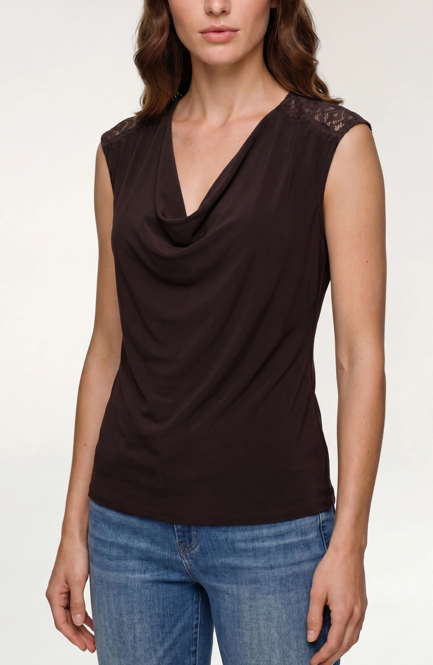 Woman wearing a sleeveless dark brown Java Lace Trim Tank by liverpool with lace shoulder details and draped neckline.