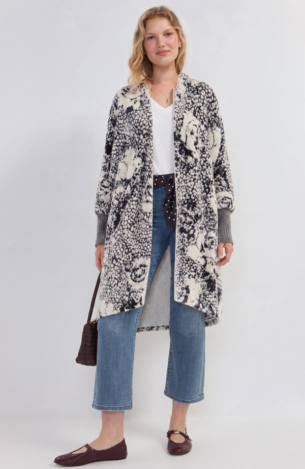 Liverpool Cardigan Sweater by Liverpool in a black and cream abstract print worn with jeans