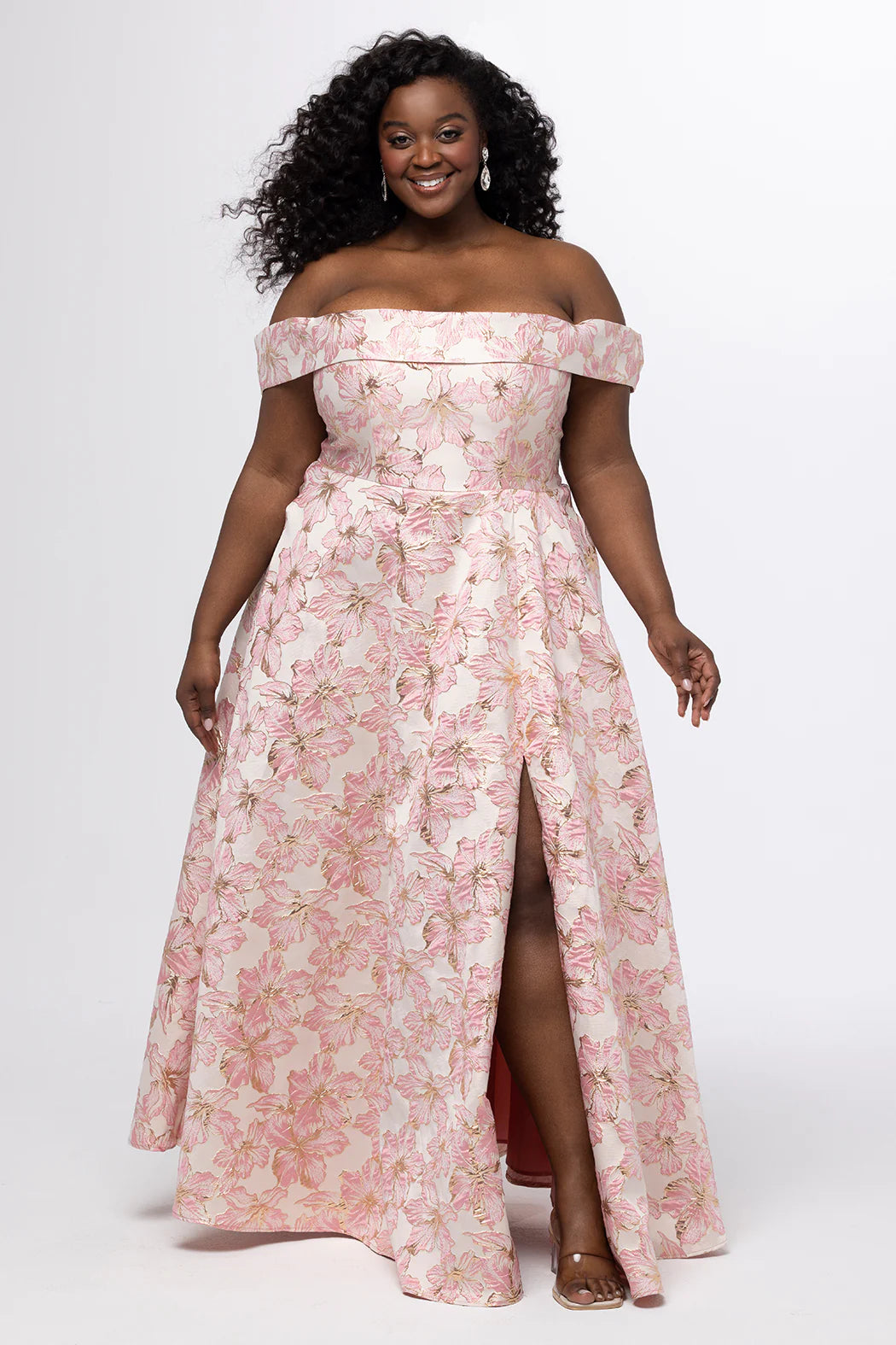 Sydney's Closet Prom Dress Style SC7440 in light pink floral with off-the-shoulder neckline and thigh-high slit