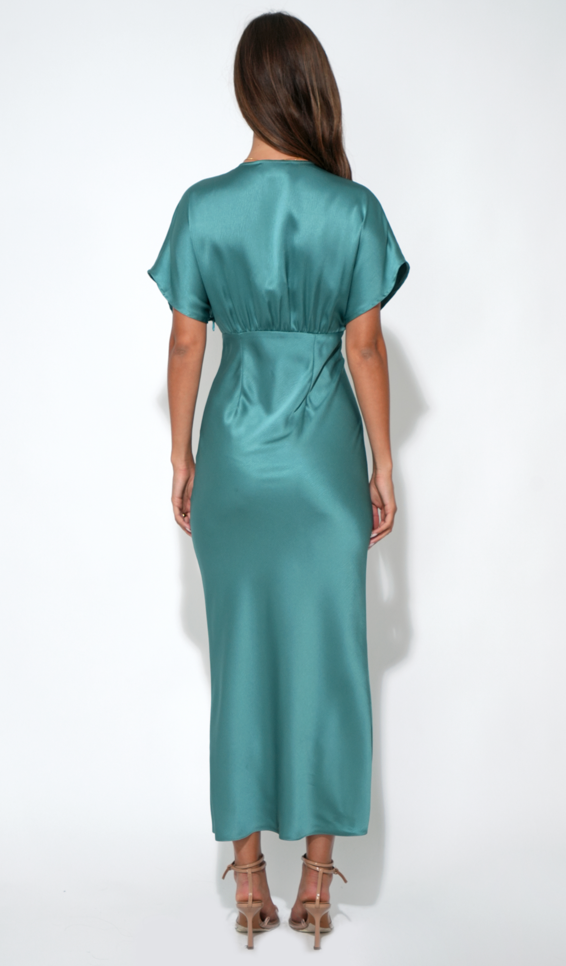 Back view of model wearing Jade Charlotte Flutter Sleeve Midi Dress by Adelyn rae in teal satin finish.