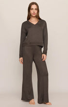 Cocoa Bean Dawn Smocked Pant by z supply shown on a model in brown with a wide leg fit