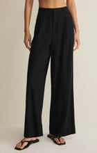 Black wide-leg Z Supply Overlook Linen Pant shown on model wearing sandals against neutral background