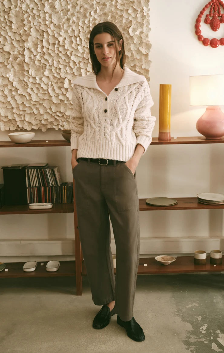 Golden Olive Colman Bowed Utility Pant by z supply styled on a model with a cream knit sweater