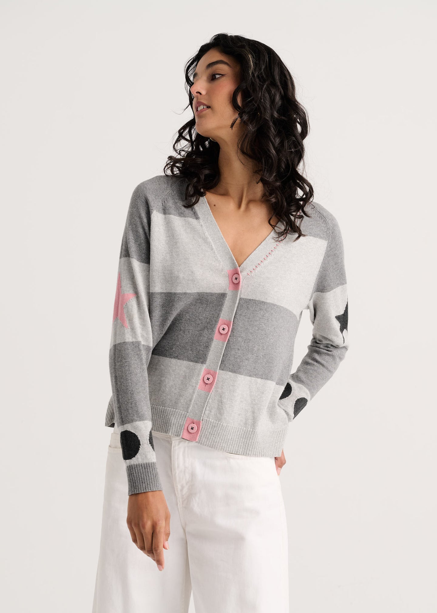 Marl Stripe Cardigan by zaket & plover worn by a model with white pants