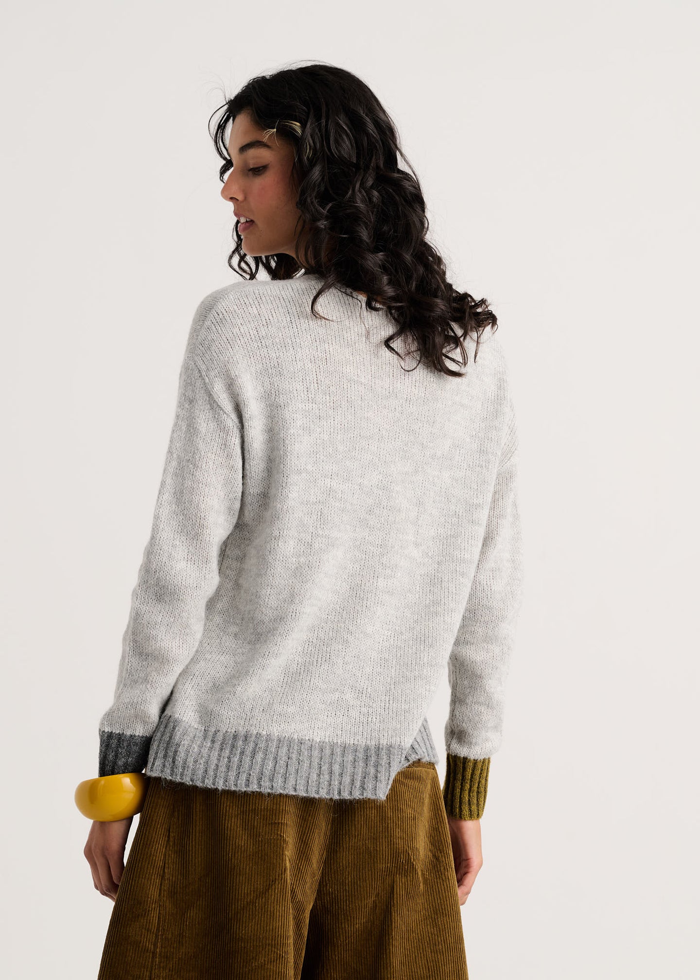 Heather Modern Easy V-Neck Sweater by zaket & plover shown on model from behind