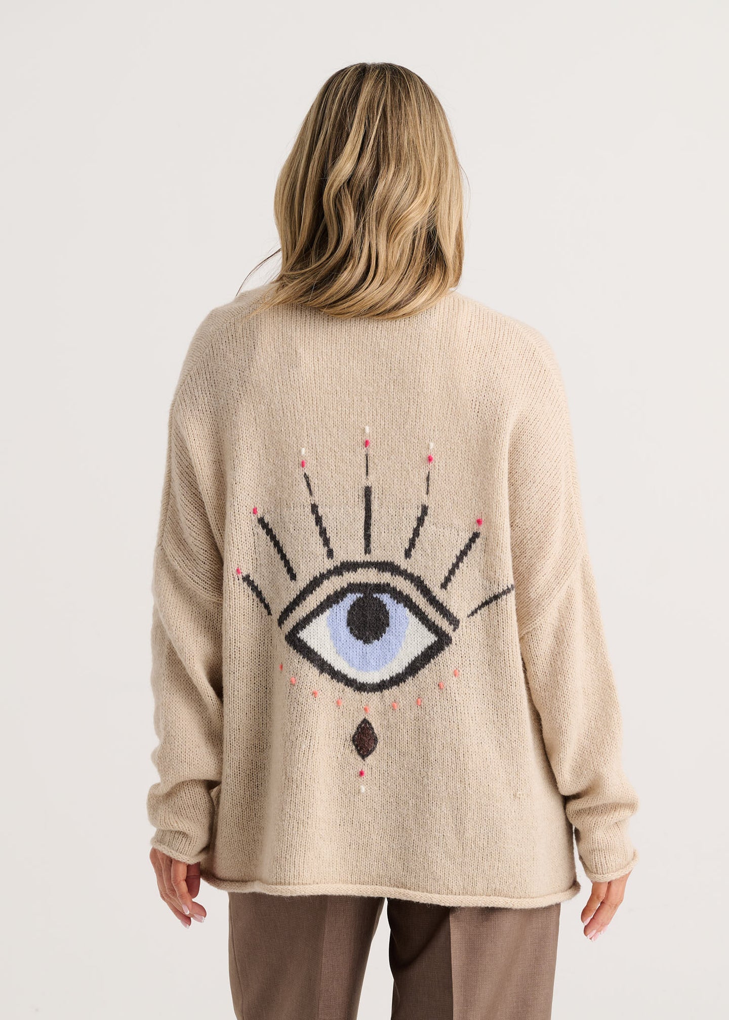 Taupe Good Energy Cardigan by zaket & plover shown from the back with a large eye graphic and relaxed fit