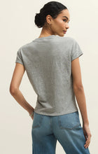 Woman wearing a gray Z Supply Modern Slub Tee with short sleeves paired with blue jeans, viewed from the back.