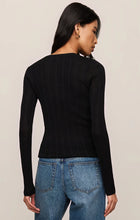 Woman wearing Black Rowena Fine Knit Sweater by z supply, shown from back with long sleeves and fitted design
