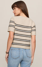 Woman wearing Light Oatmeal Heather Gatewood Stripe Sweater by z supply with short sleeves and fitted hem