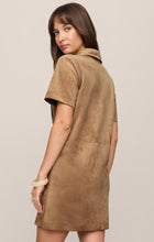Woman wearing a light sand suede mini dress by z supply, shown from the back with short sleeves and collar detail