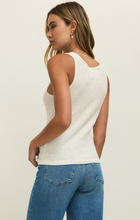 Side view of woman wearing z supply Cloud Classic Slub Scoop Tank in soft fabric paired with jeans