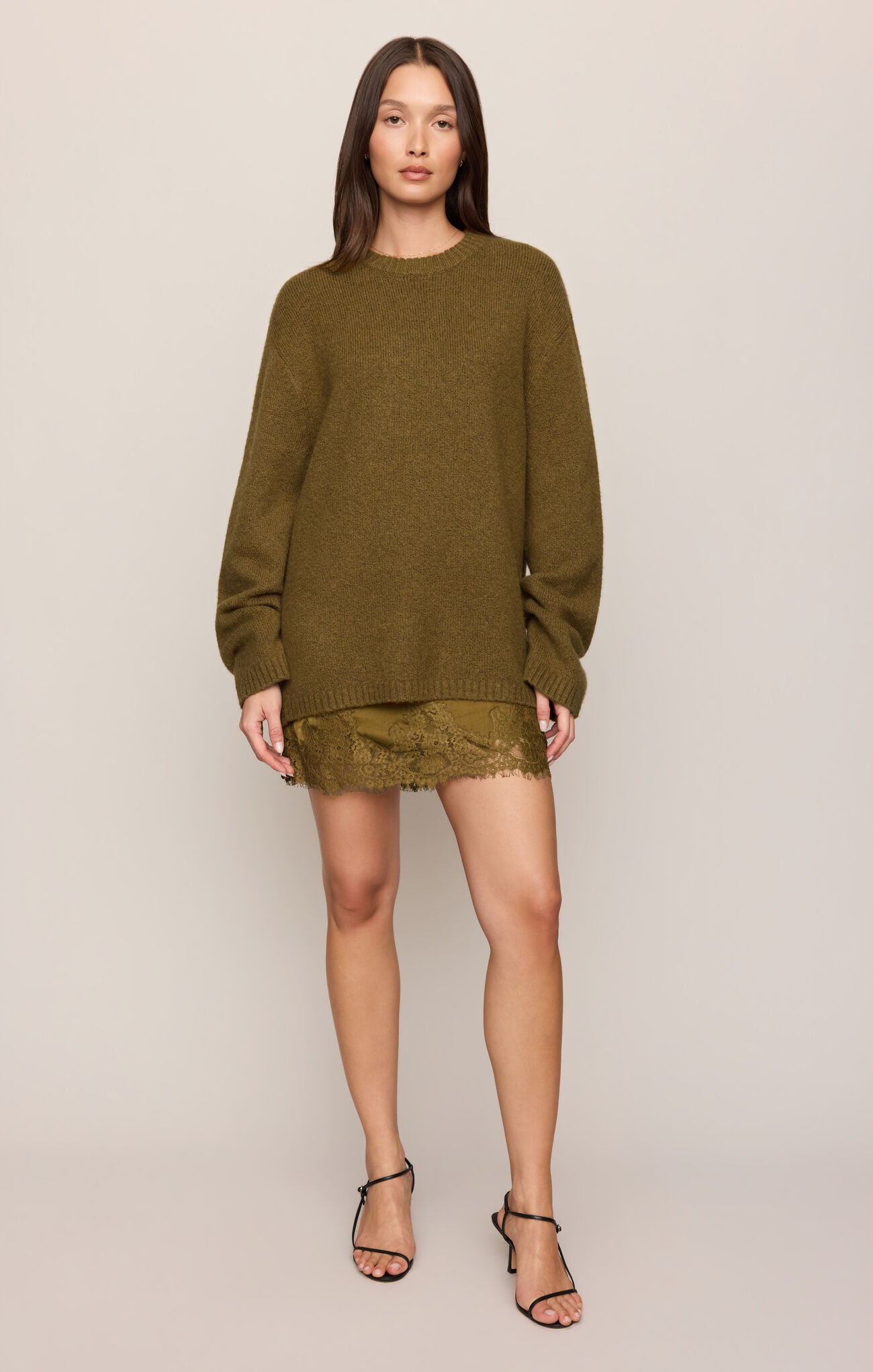 Golden Sage Chill Mode Sweater by z supply modeled in olive green with shorts and sandals